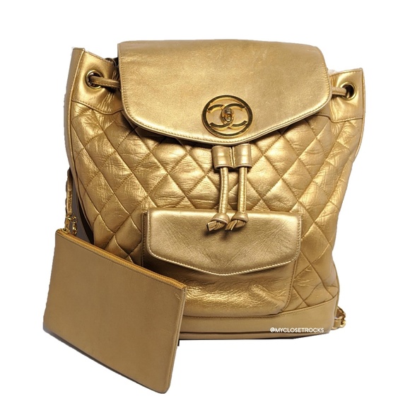 CHANEL Handbags - SOLD Chanel Gold Circle Lock Vintage Backpack